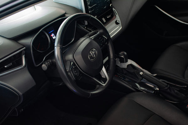 Image showing the interior of a car highlighting the automatic gear selector and power steering wheel